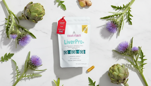 Liver Detox Supplement: Nutrian Liver Pro+ flat lay with artichoke and milk thistle